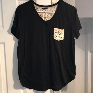 Casual black Rue 21 T-shirt with lace detail.